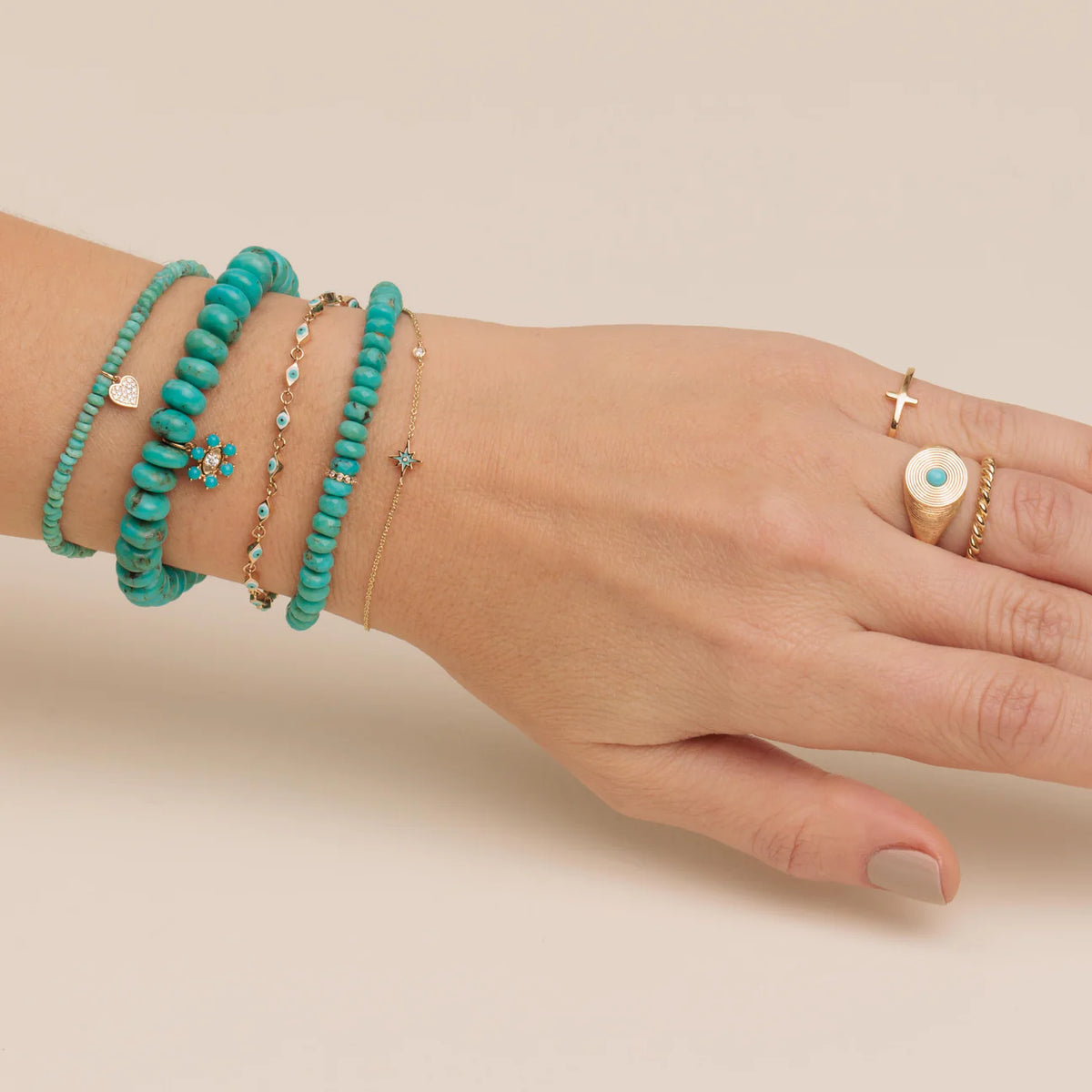 GOLD &amp; DIAMOND RONDELLE ON TURQUOISE